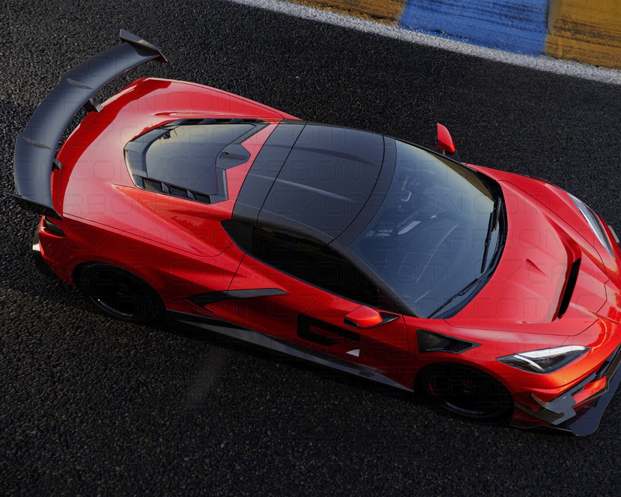 Angled top-down view of a red Chevrolet Corvette C8 ZR1 Stingray with a black carbon fiber hood and rear spoiler